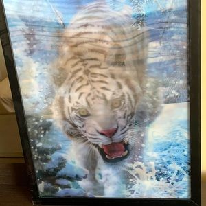 I’m selling a poster of a changing picture it’s a wolf and a tiger looks cools